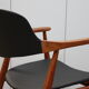 Vintage armchair in teak and black leather model Casina 60s