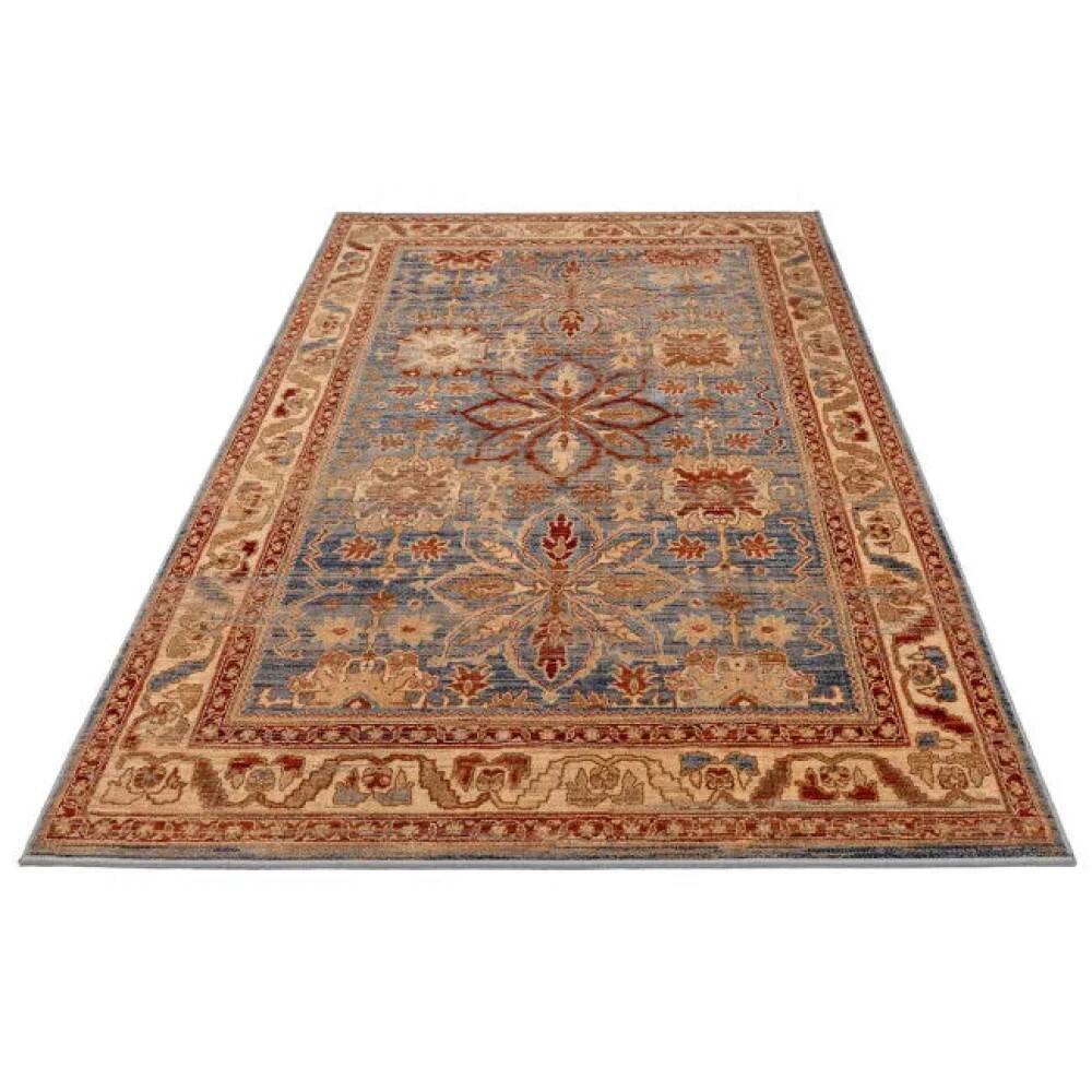 Oriental rug in beige, blue, and red wool.