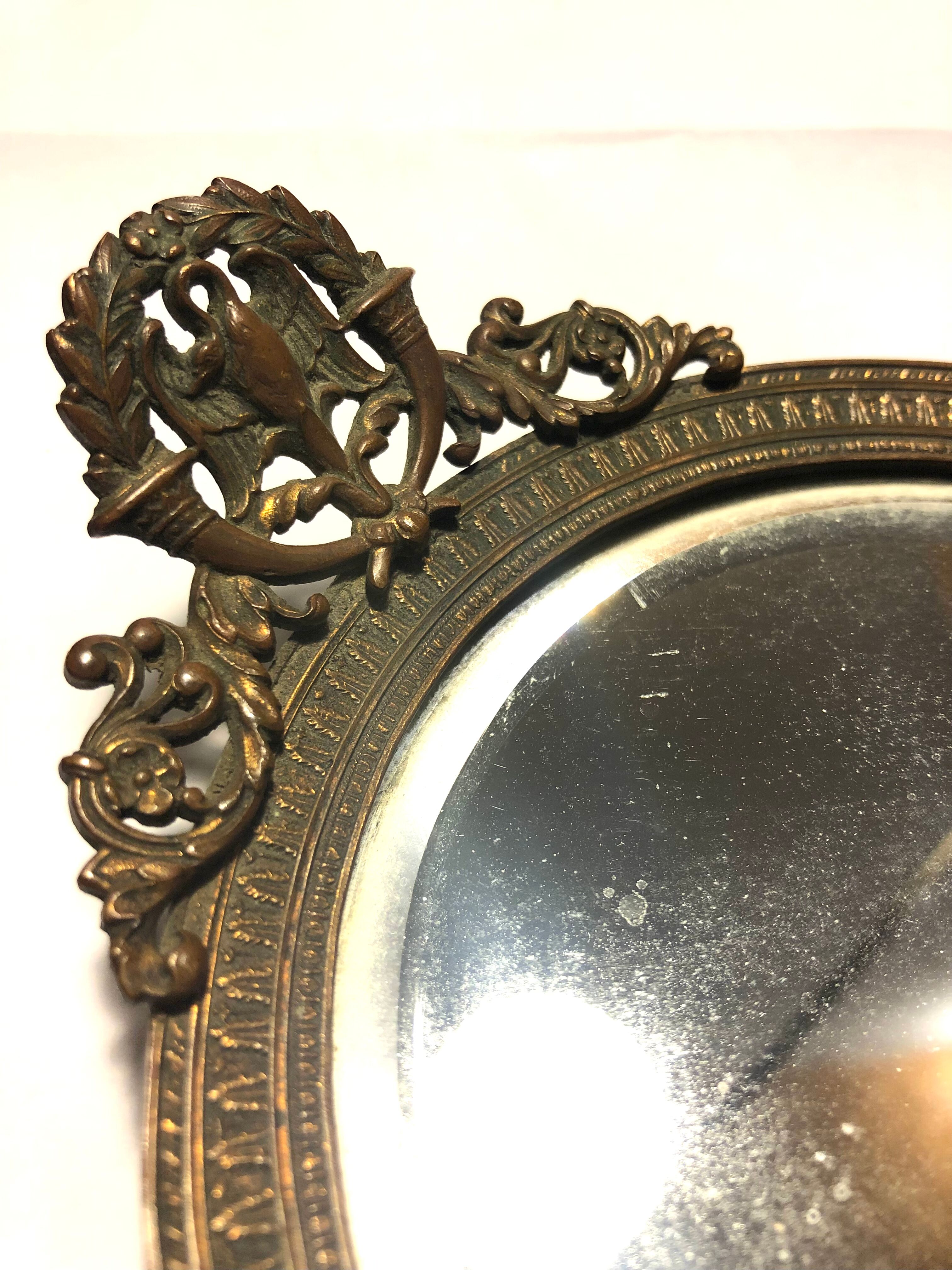 Courtesy hand mirror