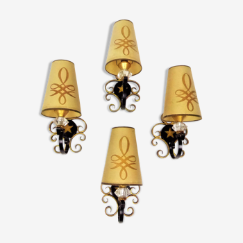1950 gold star and black metal sconces