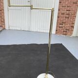Articulated arm floor lamp