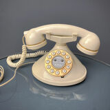 Téléphone à forme design écru et dorée