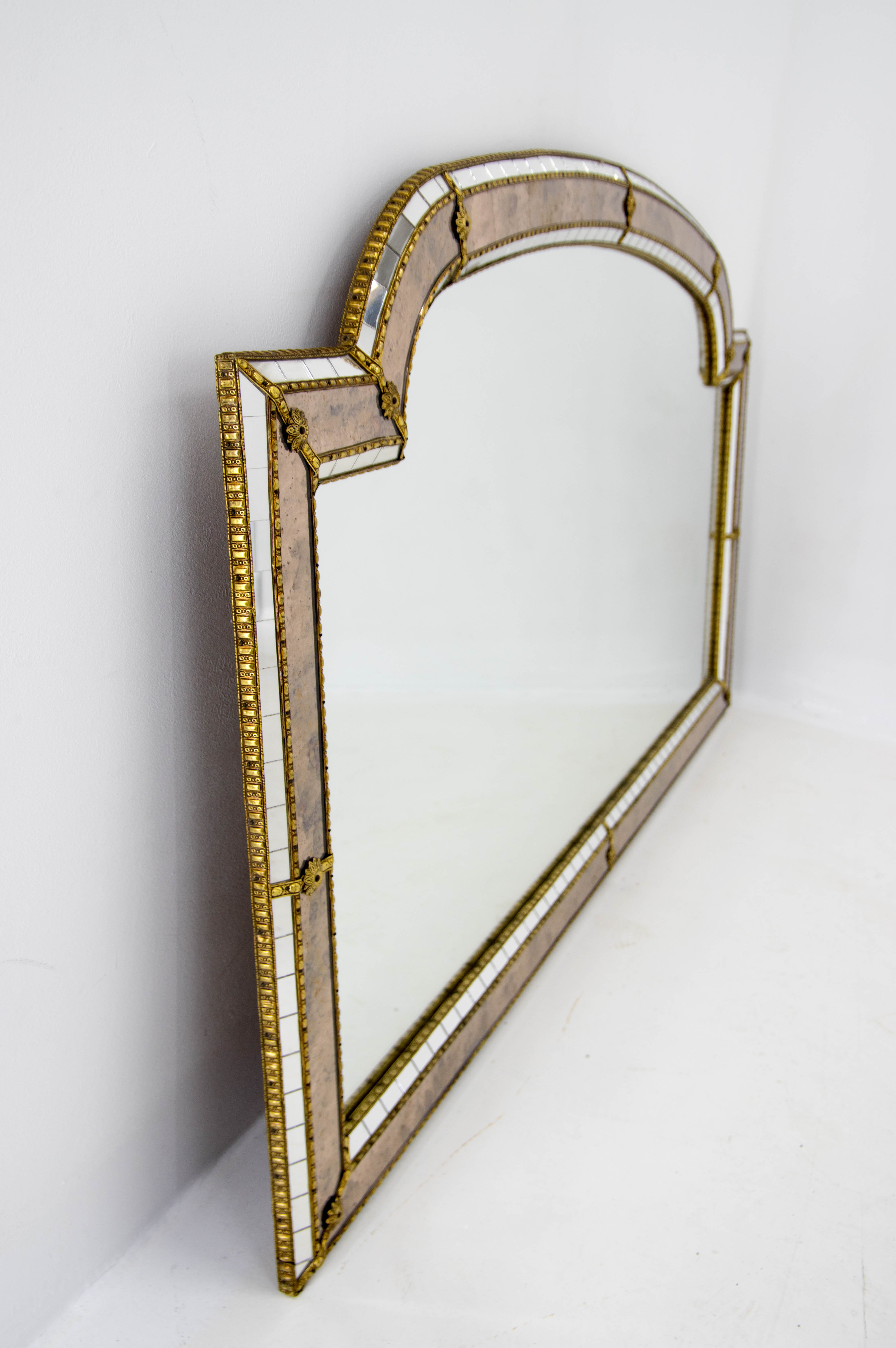 Multi-facets mirror with brass garlands, france, 1970s