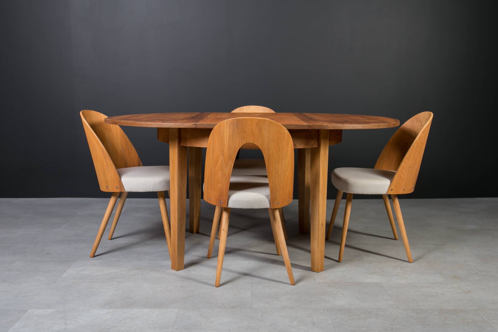 Unique dining set: Extendable round table and Czech chairs by Antonín Šuman