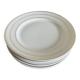 Set of 8 modernist flat plates in fine earthenware with pure gold trim, 1930.