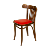 Bistro chair with a studded seat