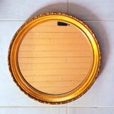 Round golden mirror