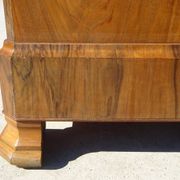 Walnut and walnut burl commode in Louis Philippe style.