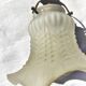 Brass gooseneck wall lamp, with brass socket and porcelain base.