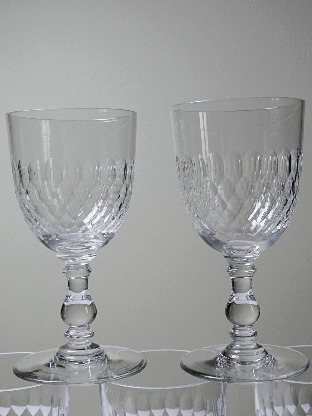 Set of 7 cut crystal port glasses by Baccarat, Richelieu variant.