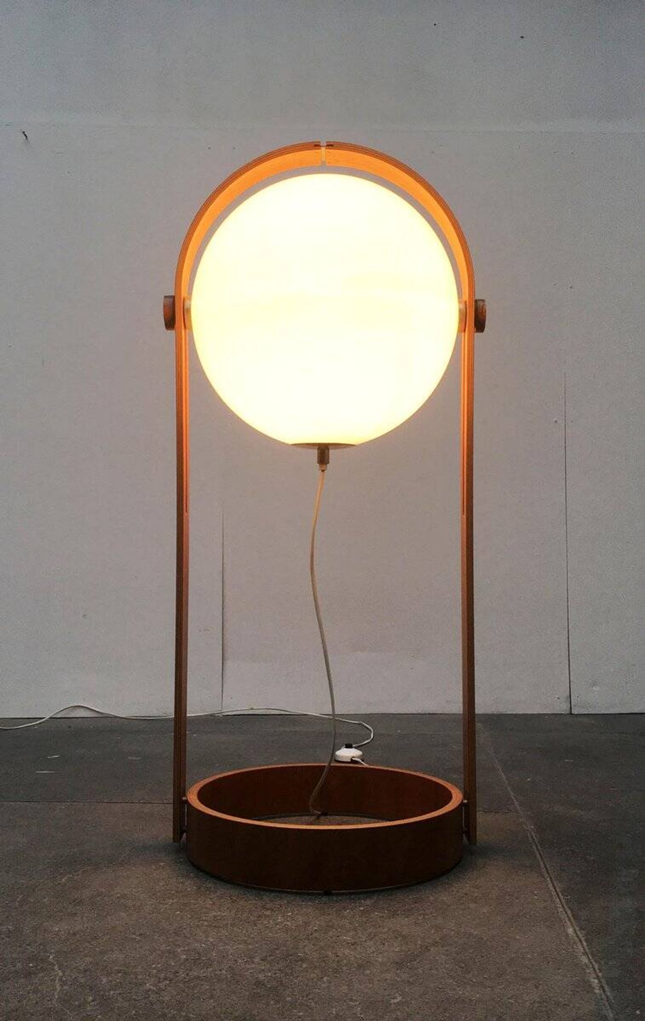 Swiss space-style floor lamp made of plastic and plywood from the 1960s.