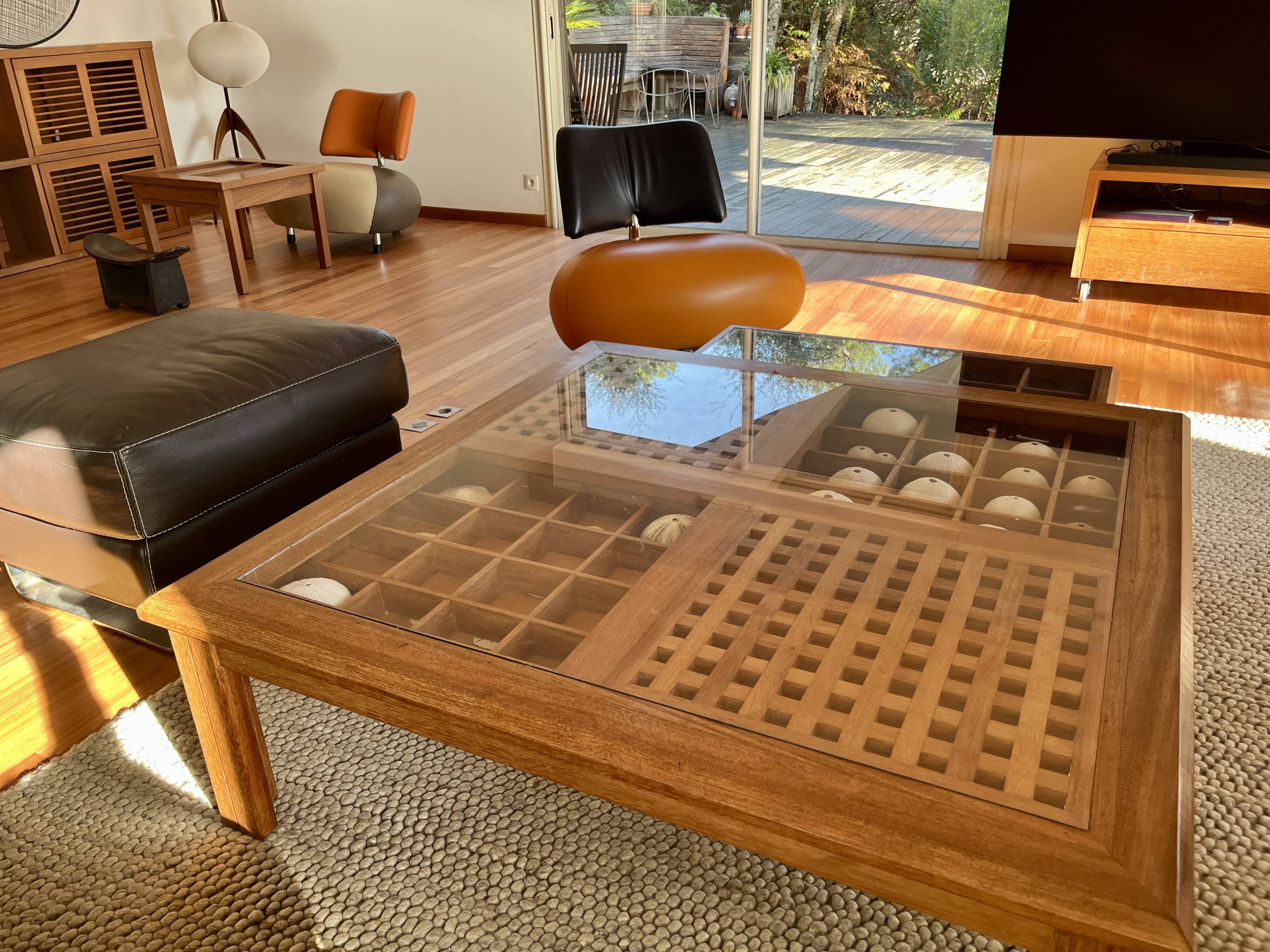Large handcrafted coffee table in exotic wood + nesting tables.