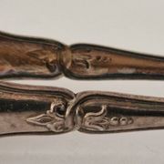 I030 Sugar tongs in silver-plated rock – Louis XV style