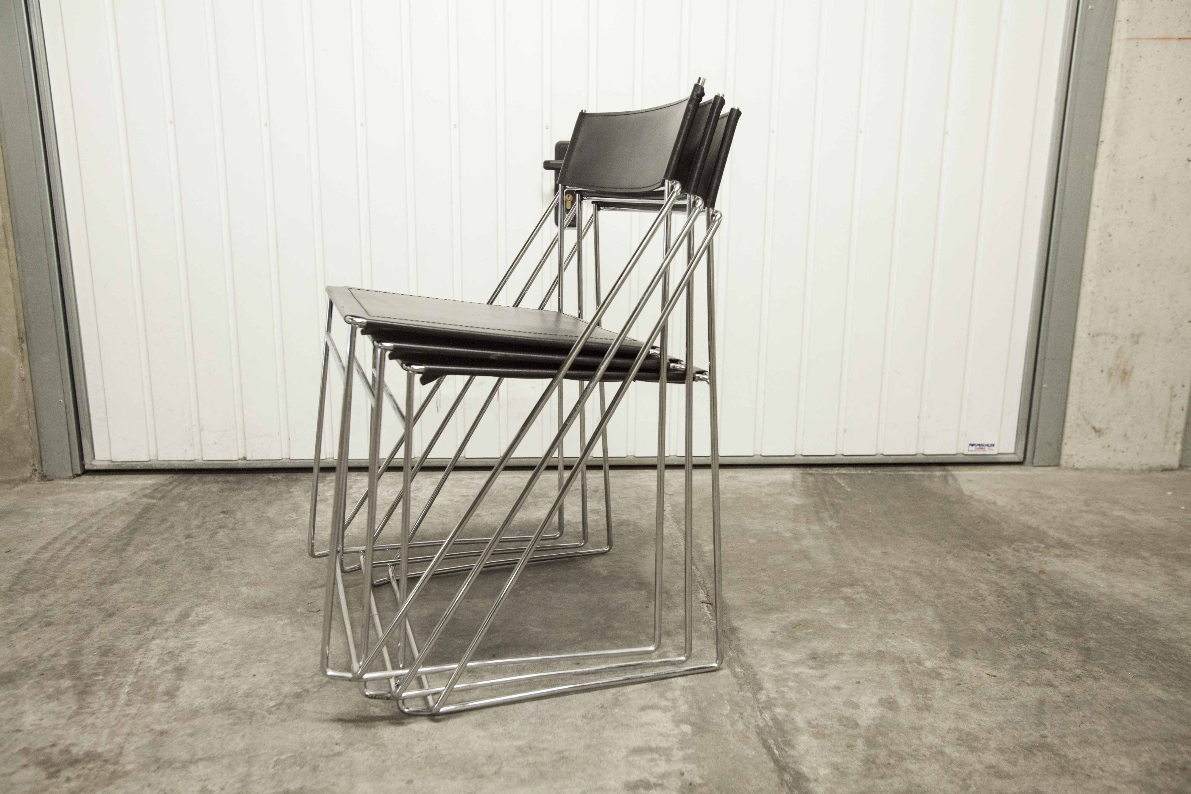 Set of 3 minimalist X line chairs by Niels Jorgen Haugesen.