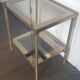 Double tray side table in brass and smoked glass.