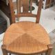 4 old straw chairs