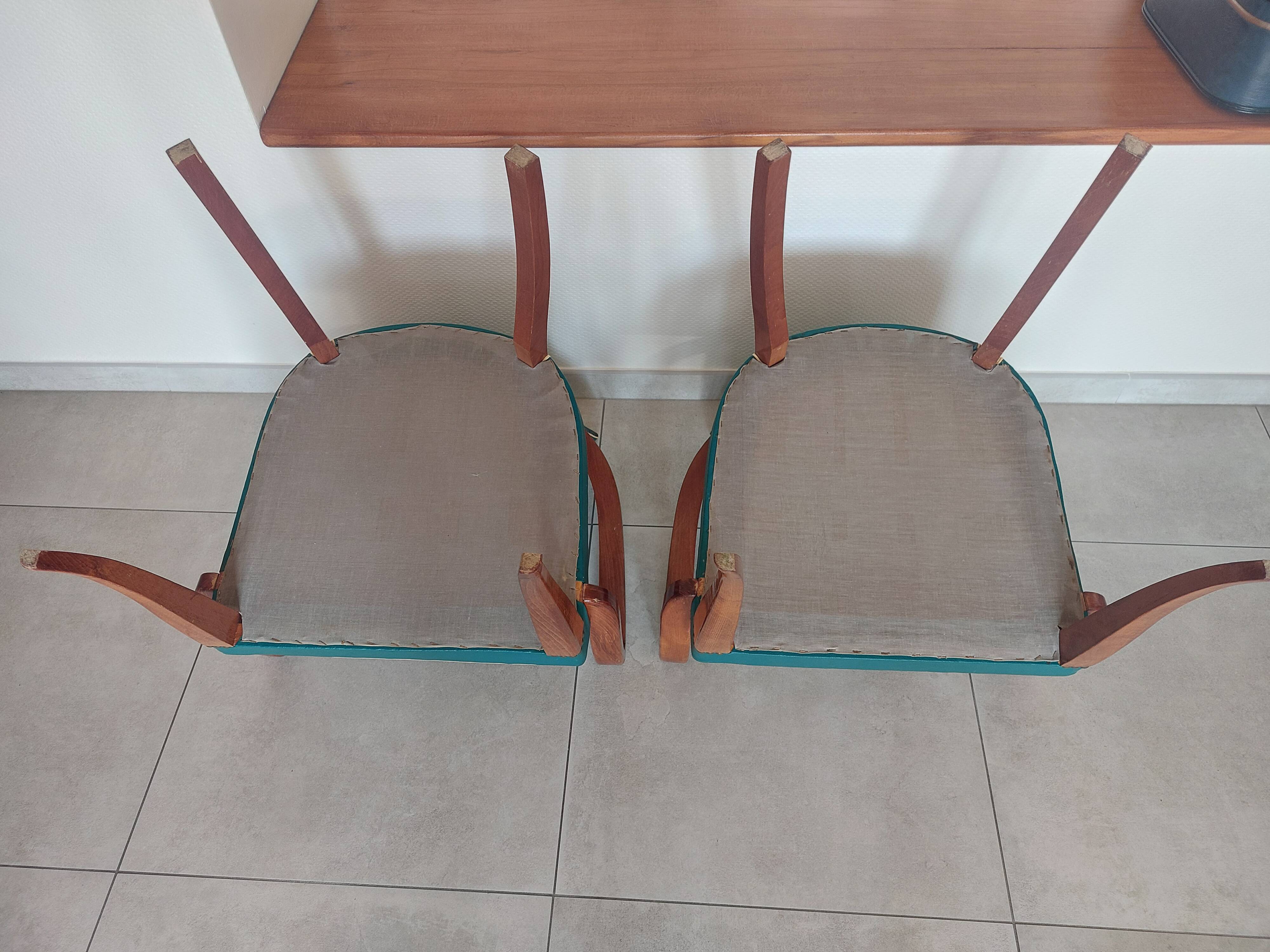 pair of green bridge armchairs