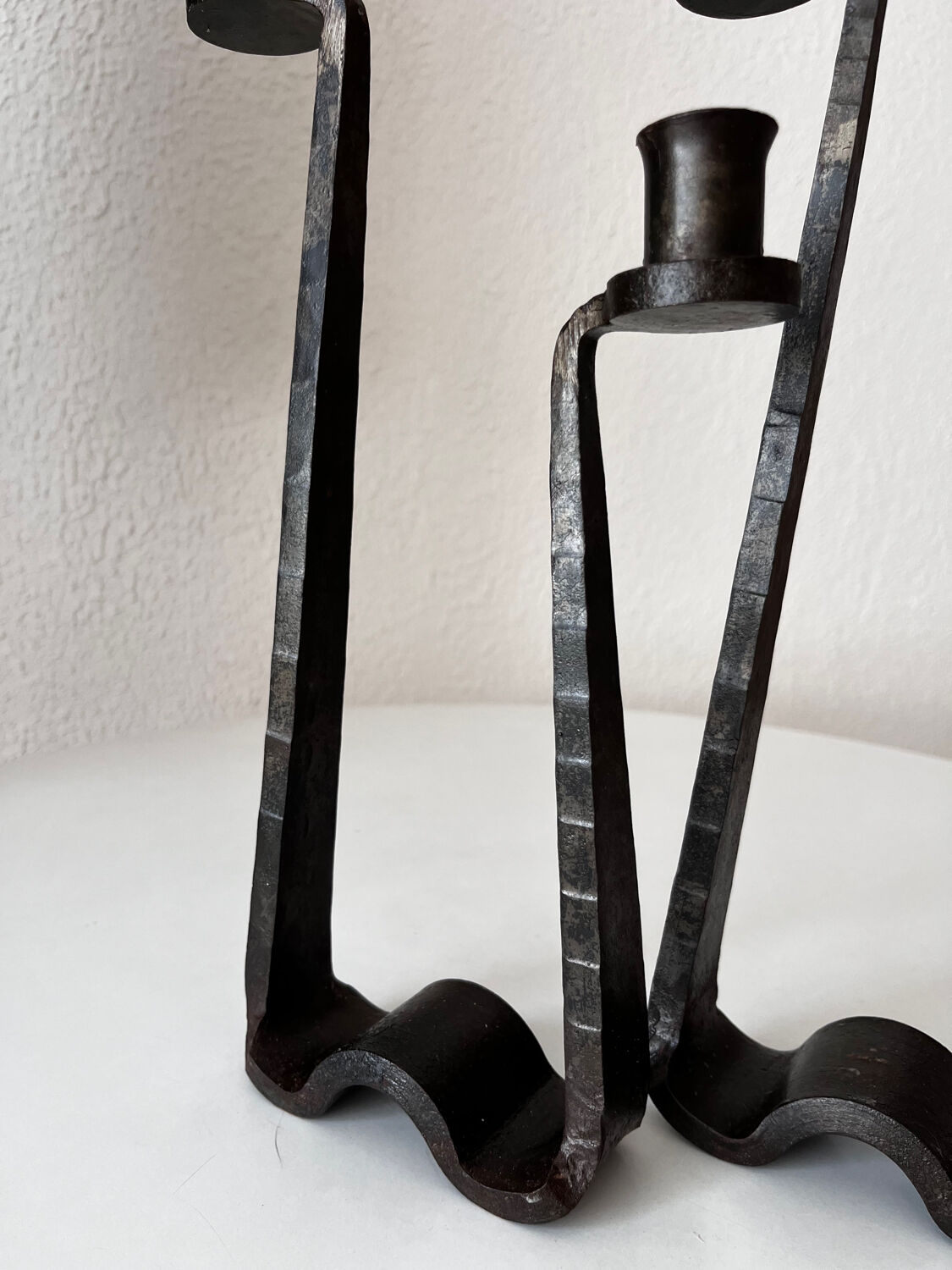 Brutalist wrought iron candlestick pair