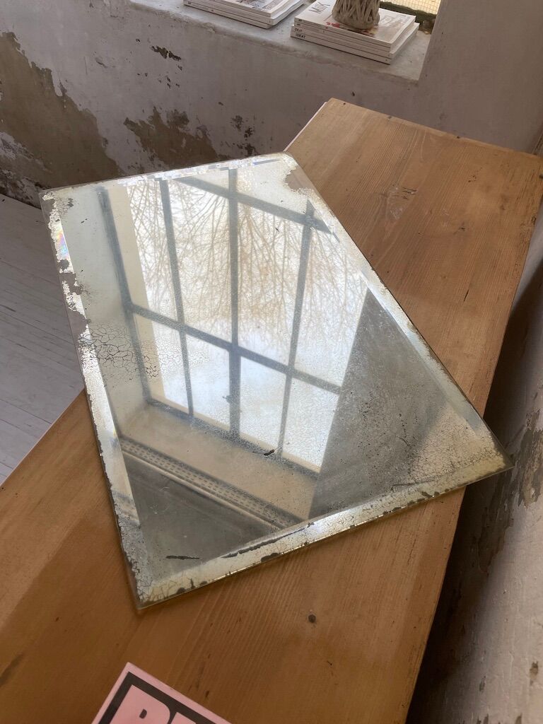 Very stung old bevelled mirror 39x60cm