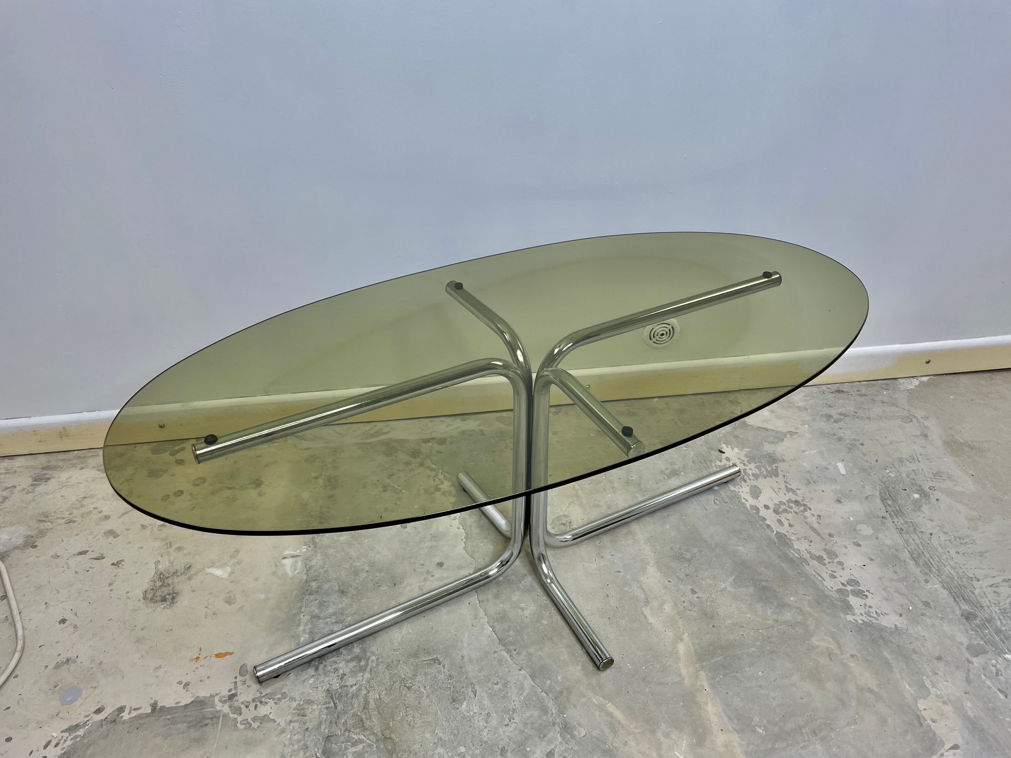 Vintage seventies coffee table in glass and stainless steel