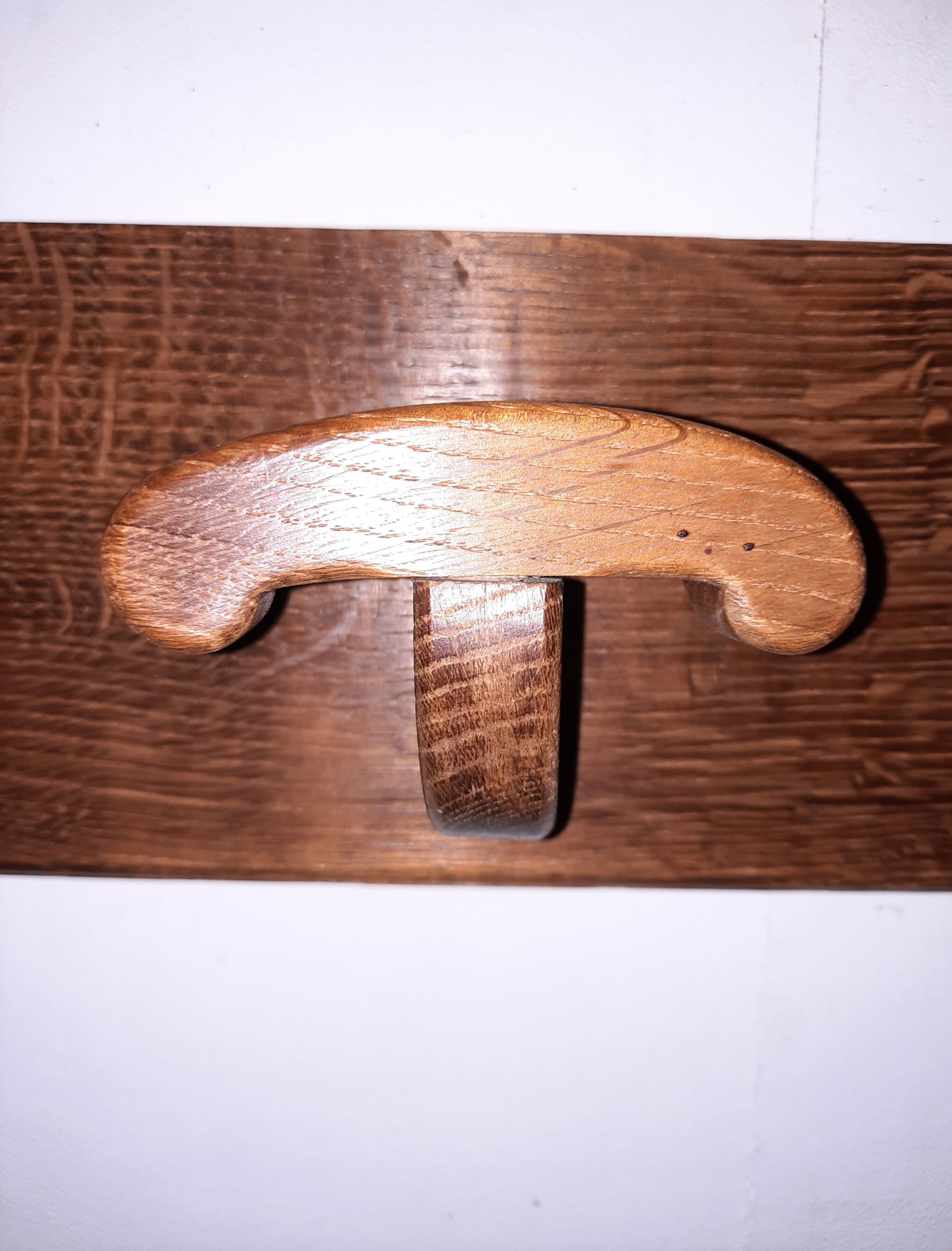 Wearing a brutalist style wooden wall coat