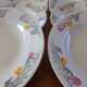 4 hollow plates and 4 old flat plates with floral decoration
