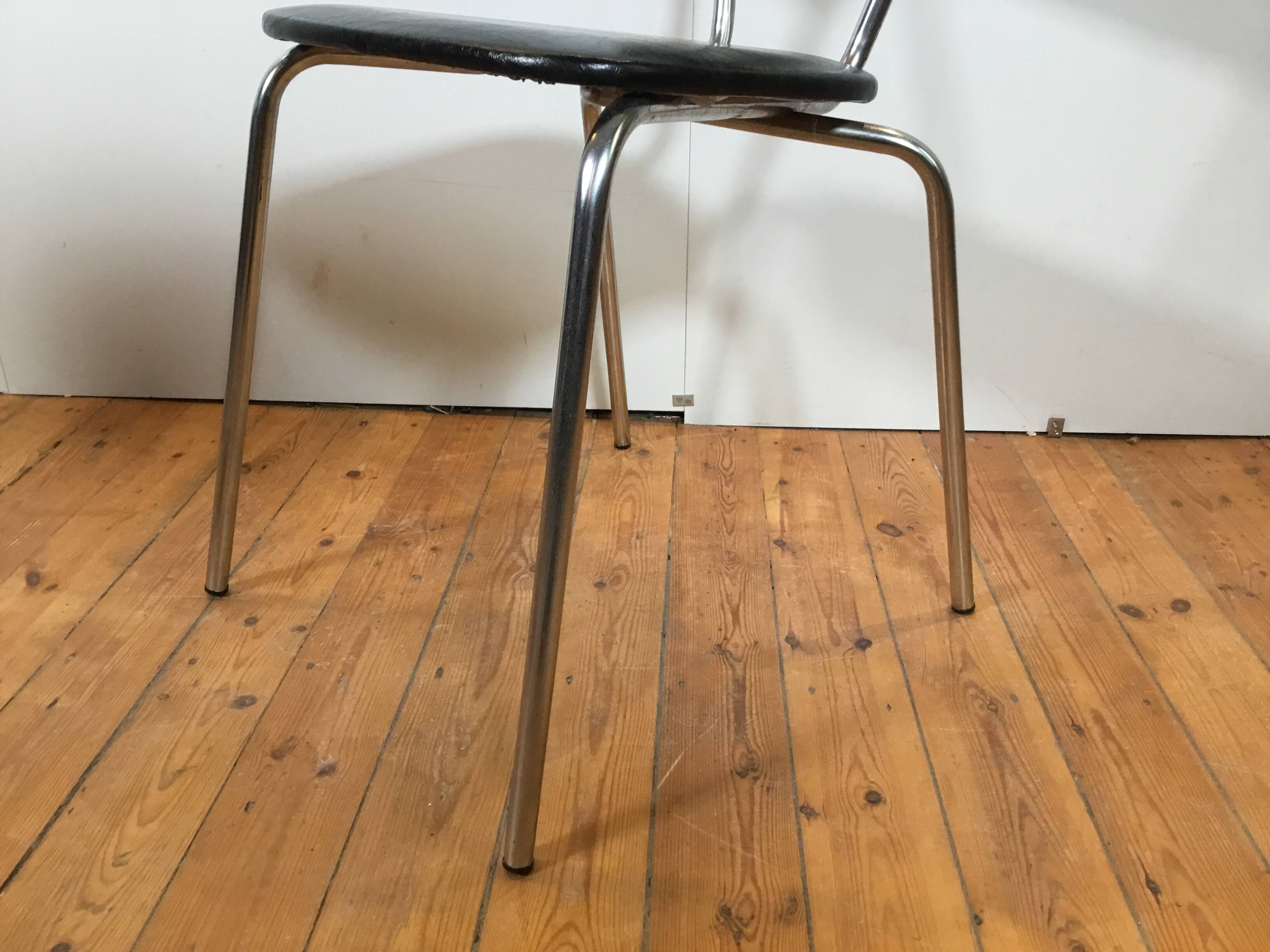 vintage chromed tubular steel stackable dining chairs