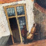 Dutch street scene oil painting in ornate frame signed Nijland