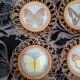 6 coasters in wooden wicker and butterfly background