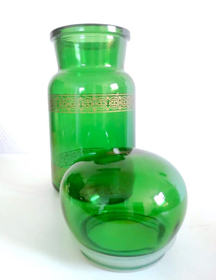 Apothecary jar in vintage green and gold glass