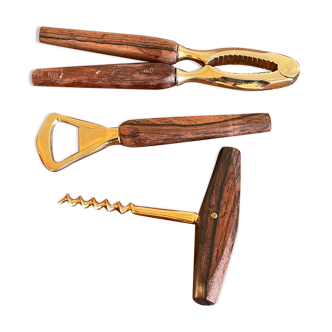 Bottle opener made of teak wood, corkscrew and nutcracker