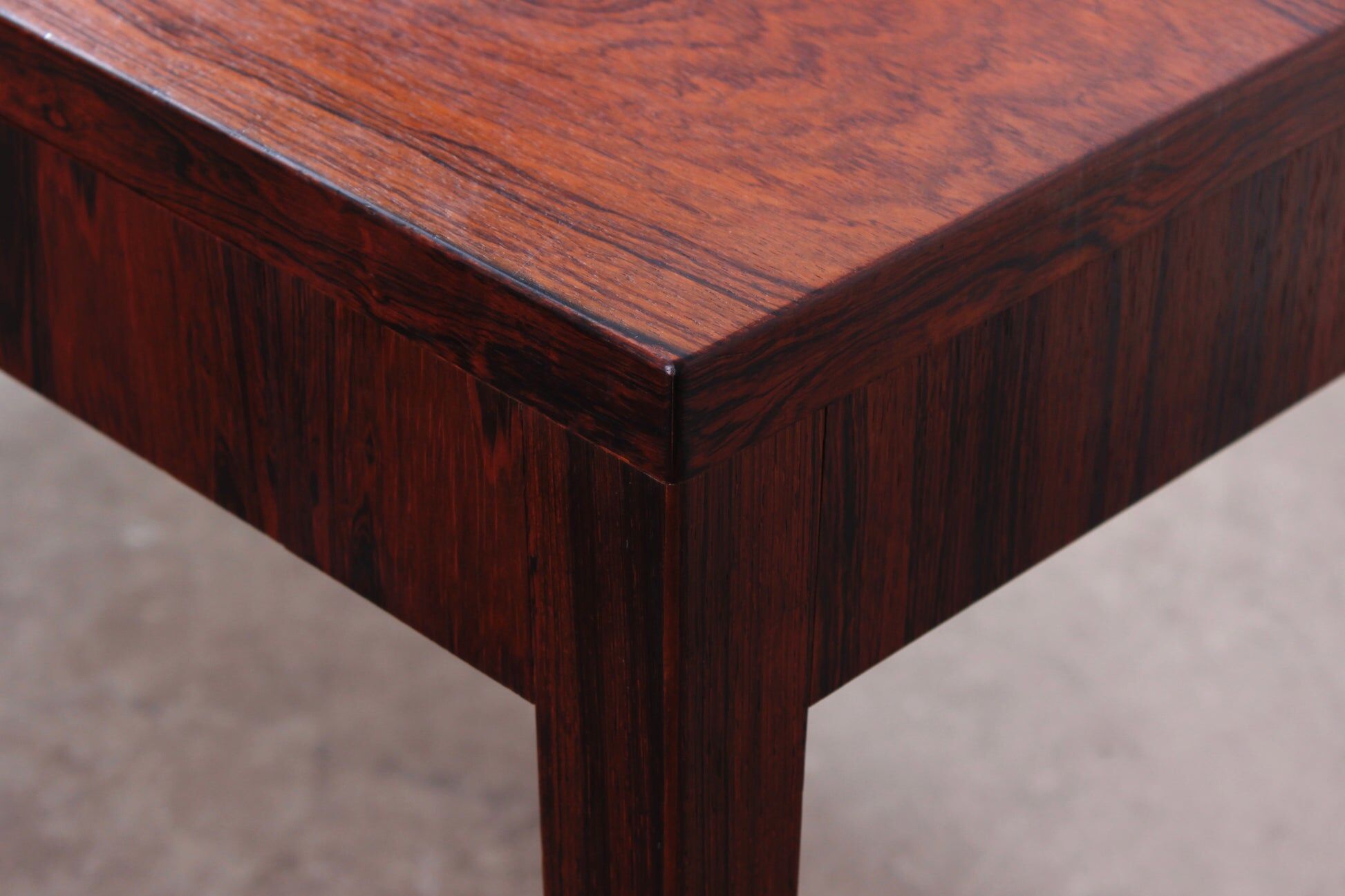 Minimalist rosewood desk by Riis Andersen