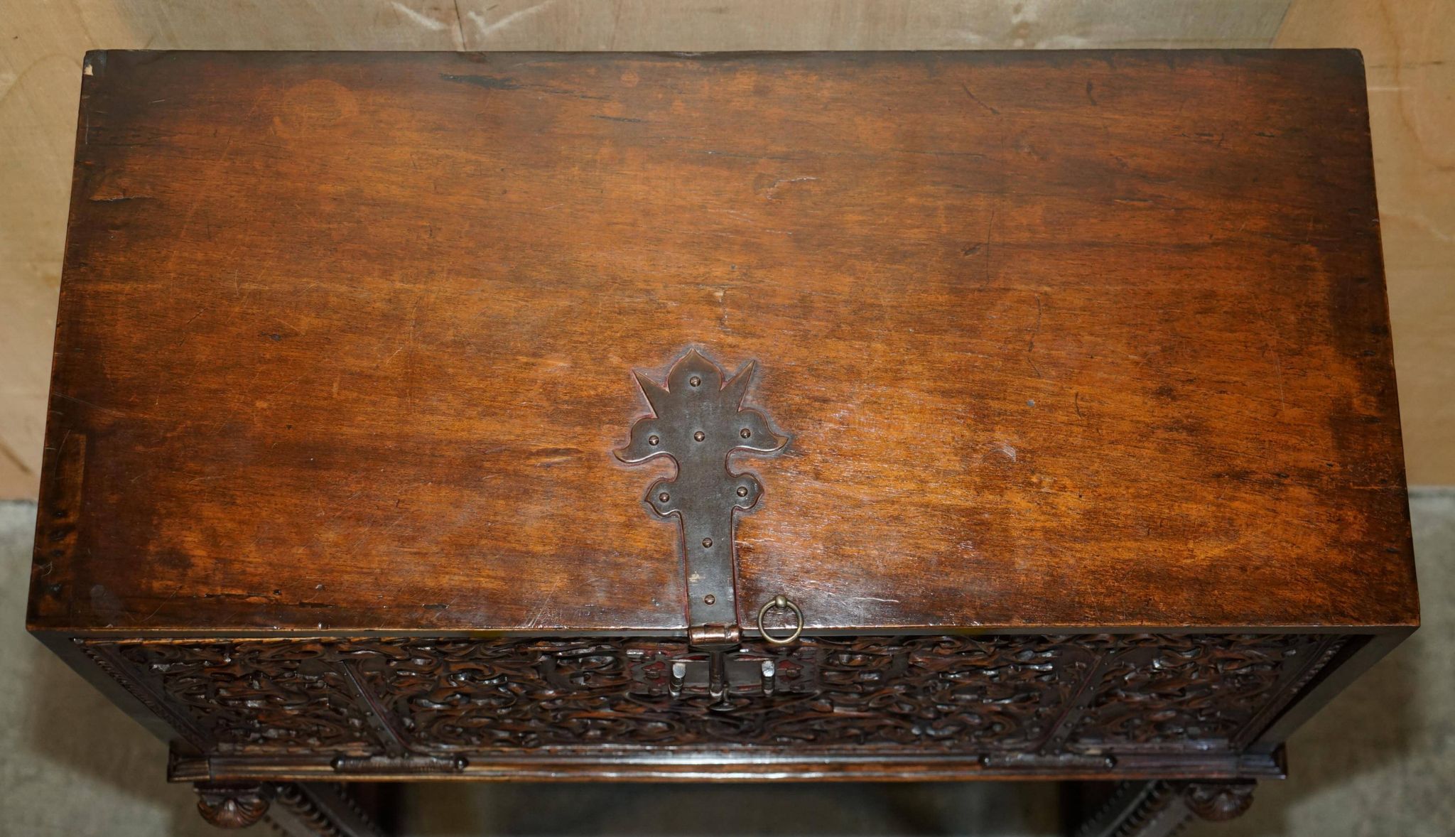 18th-century carved Spanish cabinet with hidden storage.