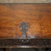 18th-century carved Spanish cabinet with hidden storage.