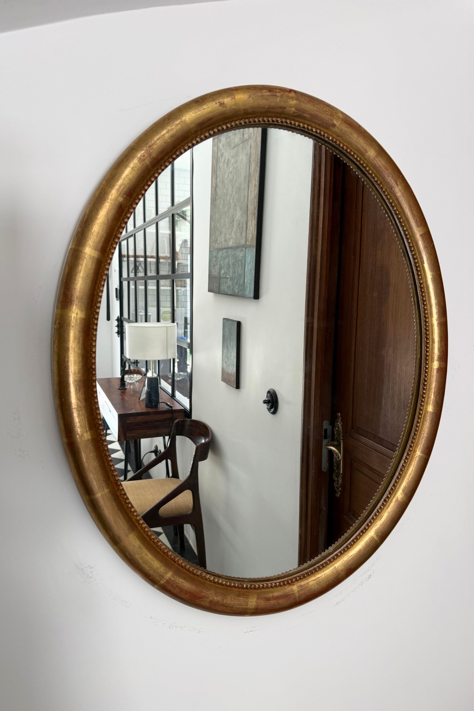 Oval mirror with gilded wood, Napoleon III medallion.