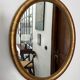 Oval mirror with gilded wood, Napoleon III medallion.
