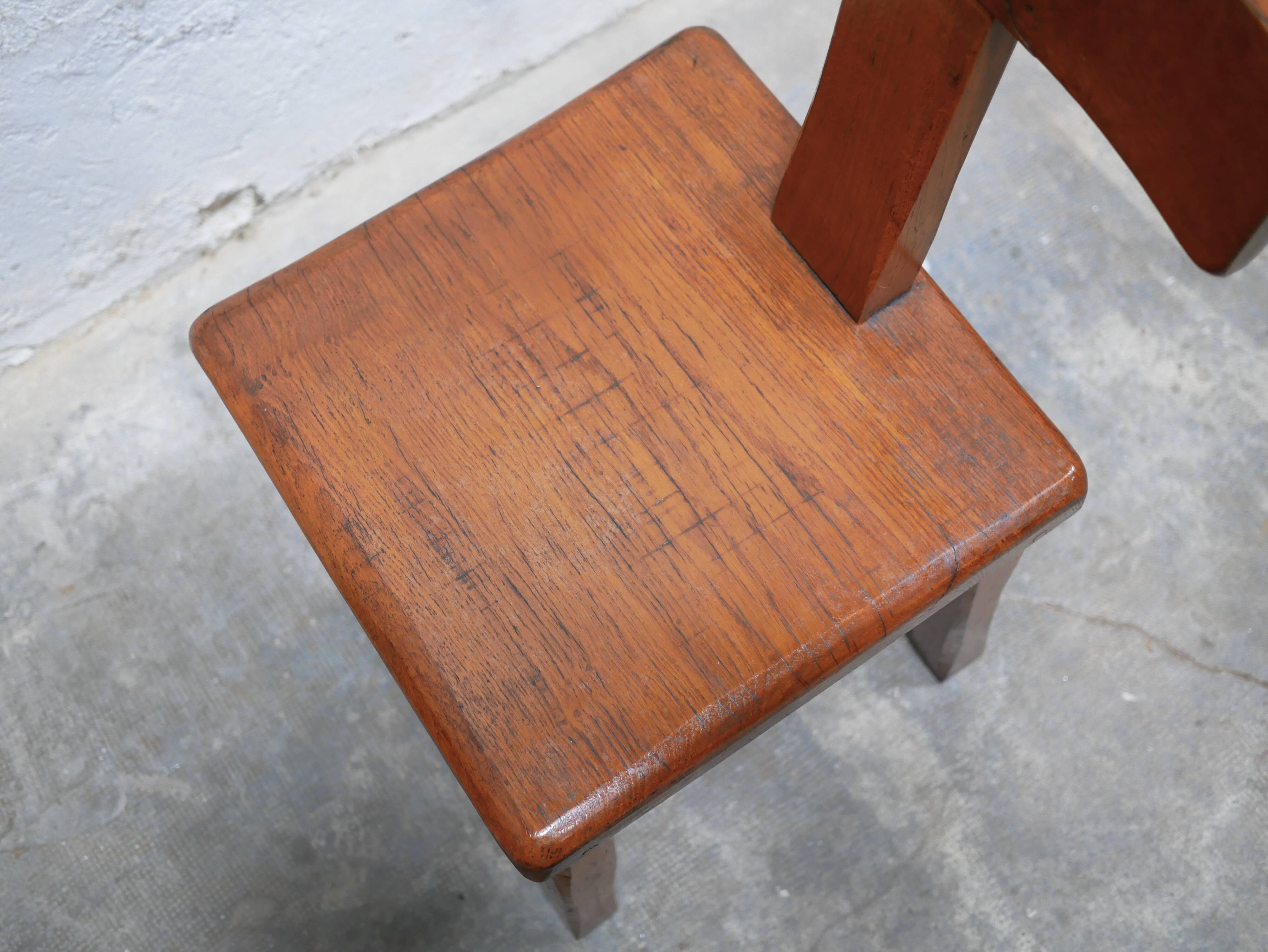 Vintage brutalist wooden T chair