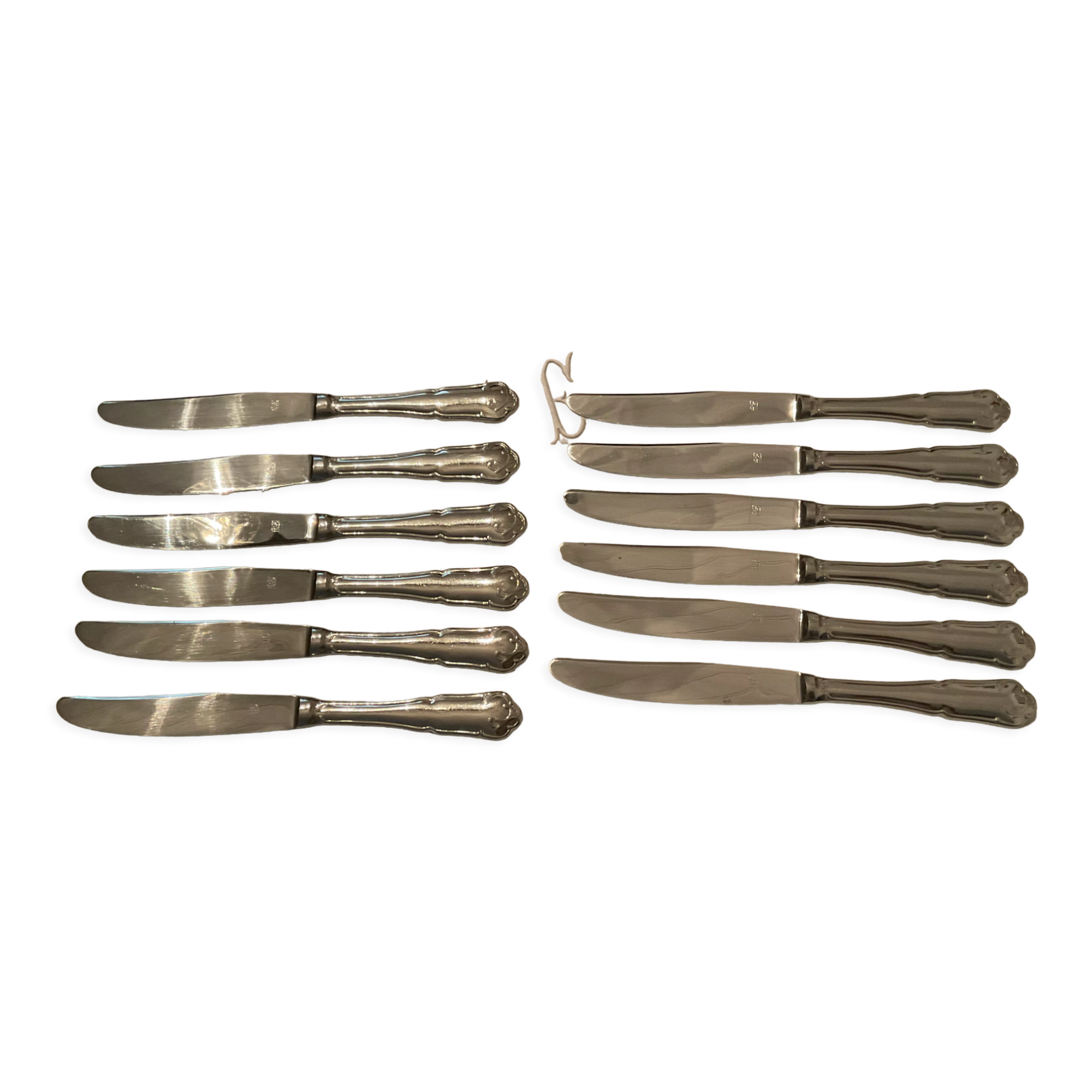 12 stainless steel knives. vintage