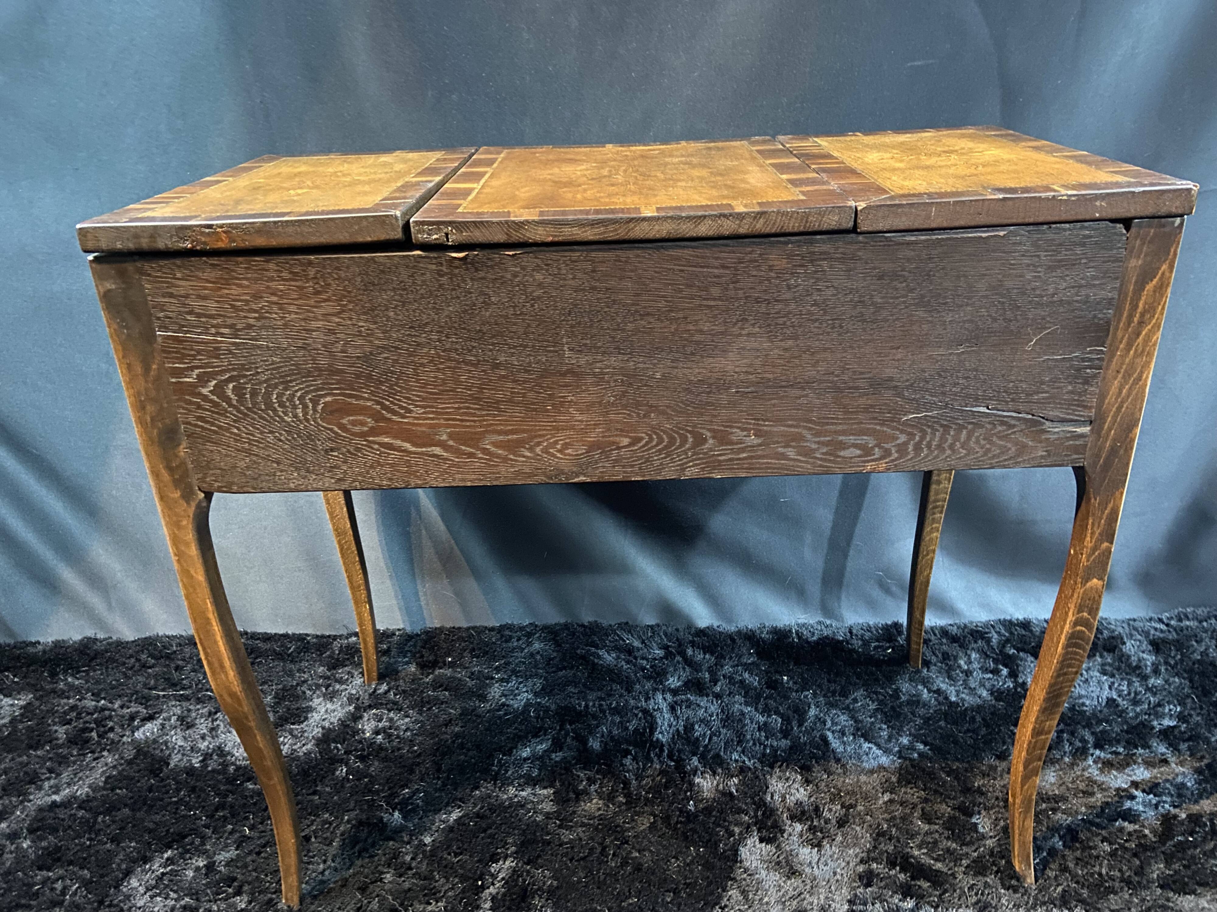 19th-century hairdresser with marquetry decoration on oak in the Louis XV Transition style.