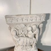 Reconstituted stone capital