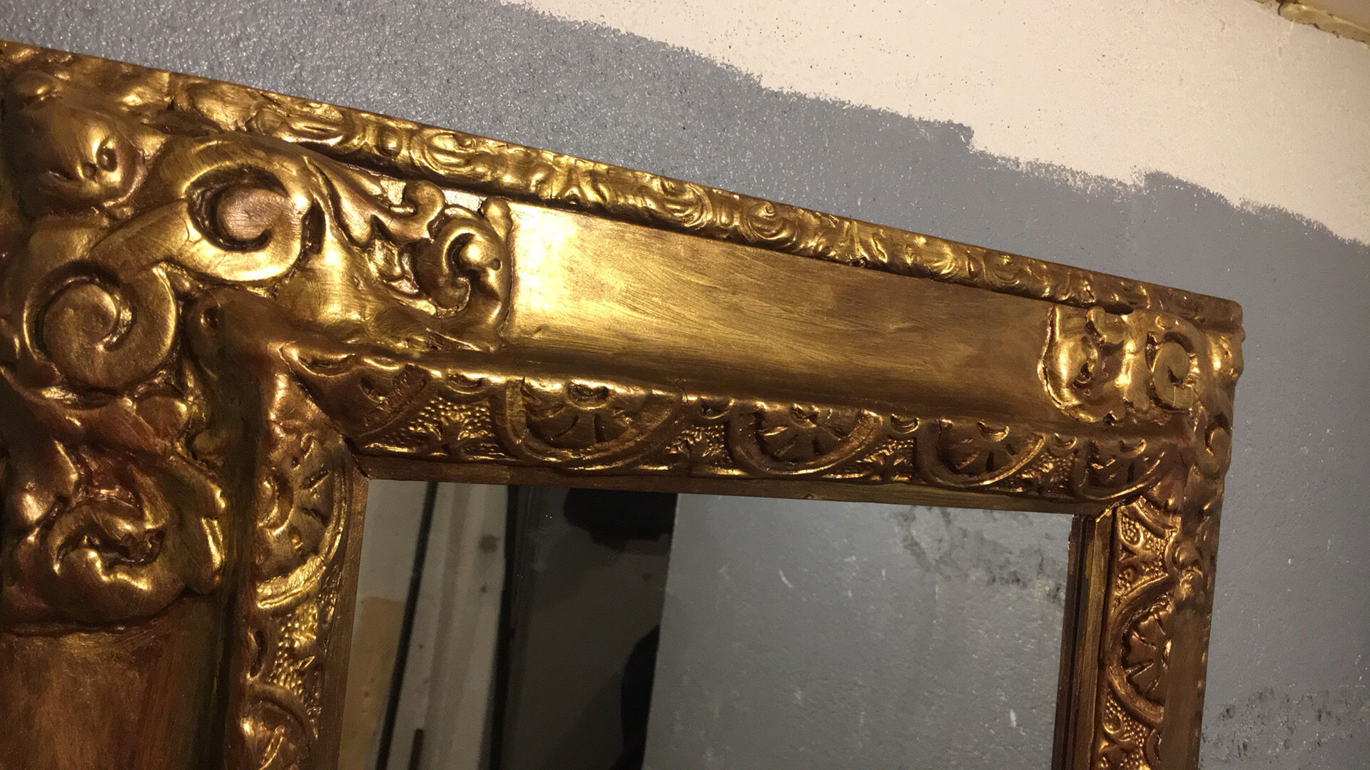 Mirror in gold frame