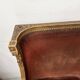 Two Louis XVI style wing chairs in gilded wood, 20th century