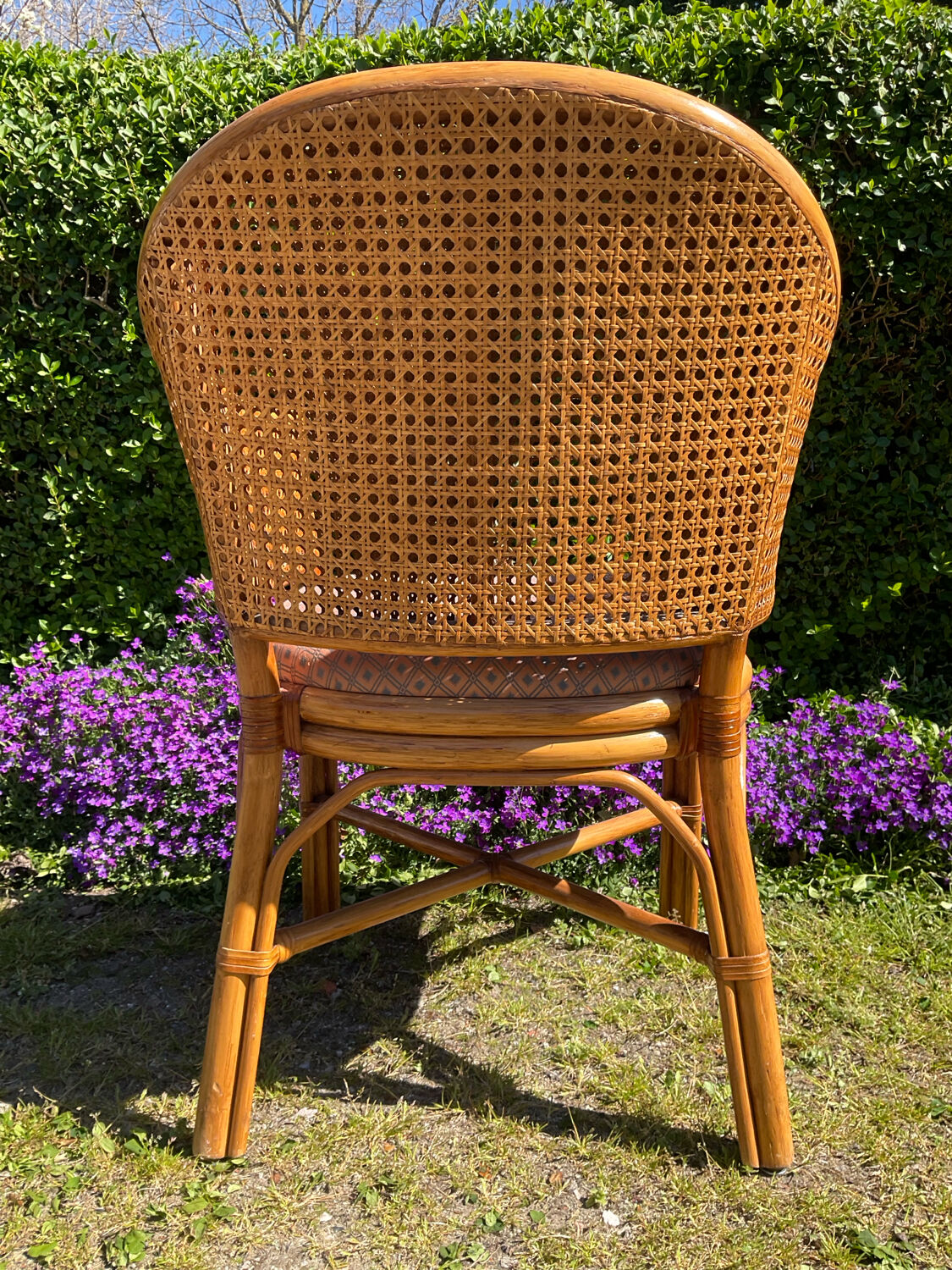 Mc Guire style armchair in rattan and caning from the 1980s.