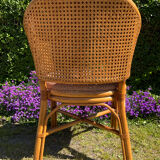 Mc Guire style armchair in rattan and caning from the 1980s.