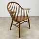 Baumann armchair with Scandinavian style bars, desk