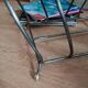 Vintage magazine rack with brass legs