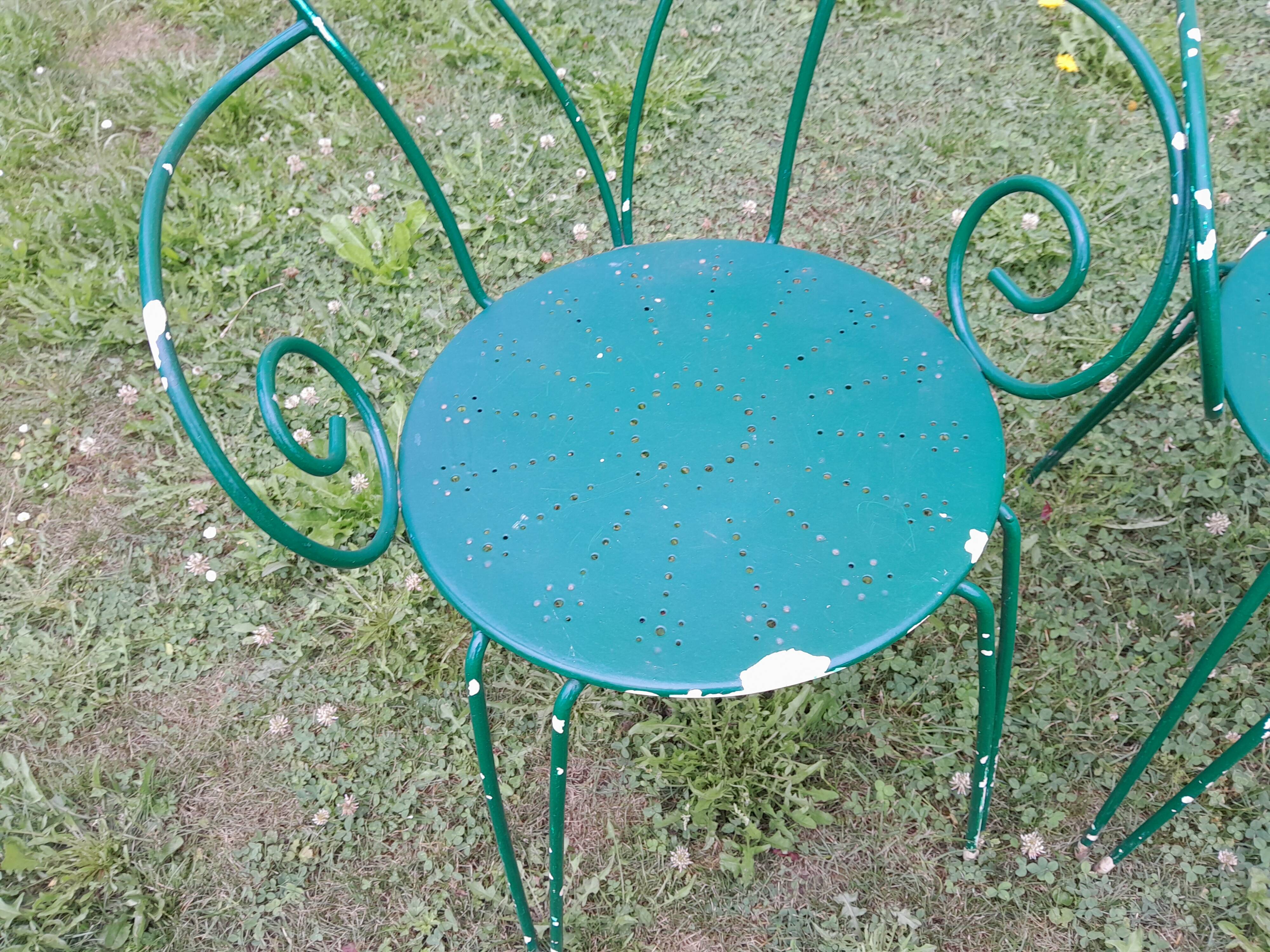 Wrought iron garden lounge table and 2 armchairs