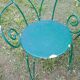 Wrought iron garden lounge table and 2 armchairs