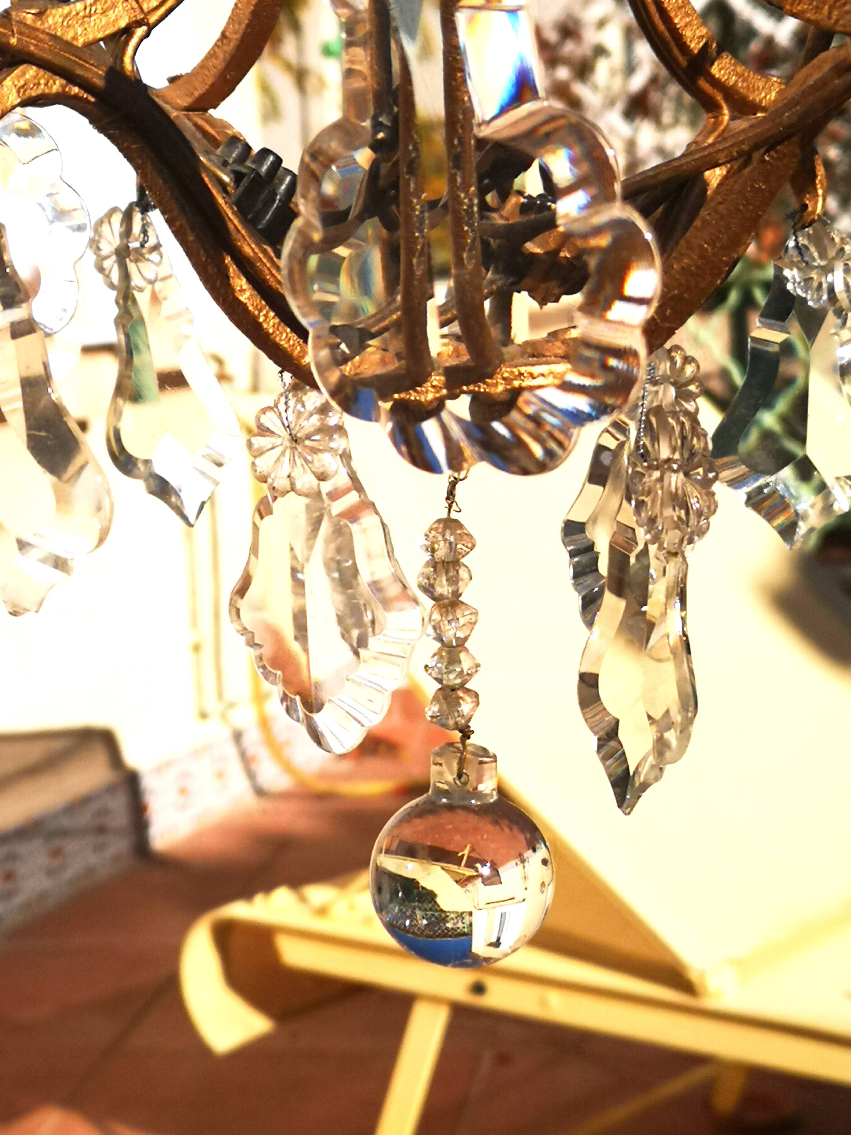 Wrought iron chandelier with pendants