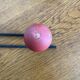 Coat rack with 3 red wooden balls